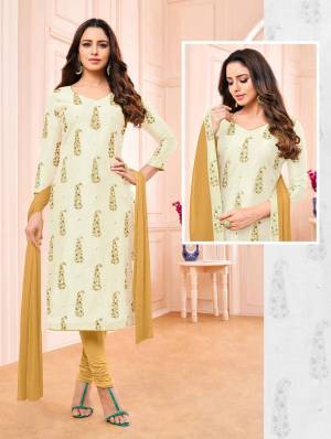 Simple And Elegant Straight Suit Is Here For Your Semi-Casual Wear In Off-White Colored Top Paired With Contrasting Musturd Yellow Colored Bottom And Dupatta. Its Top Is Modal Based Paired With Cotton Bottom And Chiffon Fabricated Dupatta. 