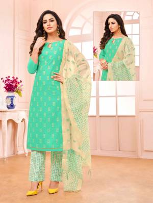 Celebrate This Festive Season With Beauty And Comfort Wearing This Designer Straight Suit In Sea Green Colored Top Paired With Cream Colored Bottom And Dupatta. Its Top Is Fabricated On Modal Silk Paired With Cotton Bottom And Modal Dupatta. 