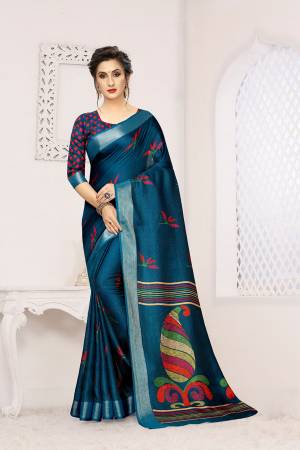 New Shade Is Here To Add Into Your Wardrobe With This Designer Saree In Teal Blue Color. This Saree And Blouse Are Fabricated On Linen Beautified With Prints. 