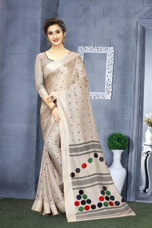 Flaunt Your Rich And Elegant Taste Wearing This Pretty Saree In Light Grey Color. This Rich Saree And Blouse Are Fabricated On Linen Beautified With Prints. 