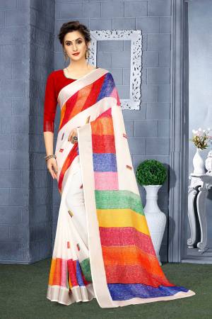 Catch All The Limelight At The Next Function You Attend Wearing This Attractive Looking Saree In White And Multi color Paired With Red Colored Blouse. This Saree And blouse Are Fabricated On Linen. 