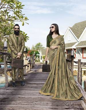 Shine Bright Wearing This Attractive Looking Heavy Designer Saree In Light Olive Green Color Paired With Dark Olive Green Colored Blouse. This Saree Is Fabricated on Art Silk Beautified With Embroidery Paired With Jacquard Silk Fabricated Blouse. Buy This Designer Saree Now.
