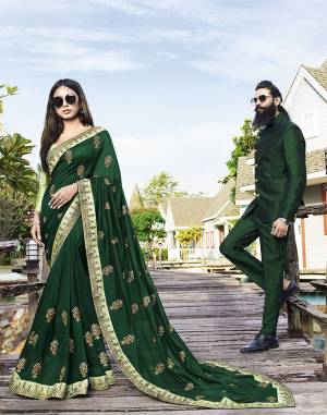 Celebrate This Festive And Wedding Season Wearing This Beautiful Heavy Designer Saree In Dark Green Color Paired With Light Green Colored Blouse. This Saree Is Fabricated On Art Silk Paired With Jacquard Silk Fabricated Blouse. Buy Now. 