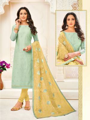 Simple And Elegant Looking Pretty Designer Straight Suit Is Here In Pastel Green Colored Top Paired With Light Yellow Colored Bottom And Dupatta, Its Top And Dupatta Are Modal Based Paired With Cotton Bottom. 