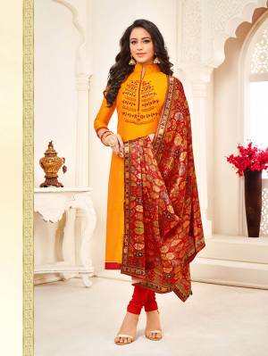 Here Is An Evergreen Ethnic Color Pallete With This Designer Straight suit In Orange Colored Top Paired With Red Colored Bottom And Dupatta. Its Top Is Fabricated On Cotton Silk Paired With Cotton Bottom And Silk Based Dupatta. Buy Now.