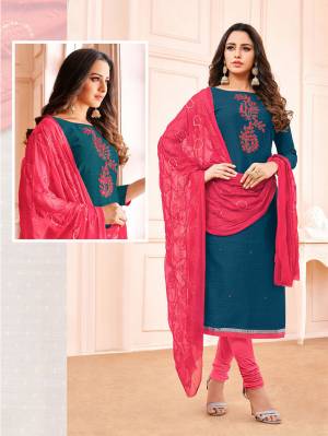 You Will Definitely Earn Lots Of Compliments Wearing This Designer Straight Suit In Navy Blue Colored Top Paired With Contrasting Dark Pink Colored Bottom And Dupatta. Its Embroidered Top Is Fabricated On Jacquard Cotton Paired With Cotton Bottom And Chiffon Dupatta. 