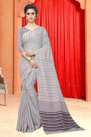 Simple And Elegant Looking Saree Is Here In Grey Color For Your Semi-Casuals Or Festive Wear. This Saree And Blouse Are Fabricated On Soft Cotton Beautified With Prints. It Is Light In Weight, Easy To Drape And Also Durable. 