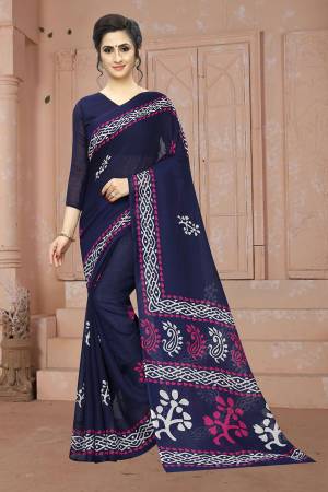 Simple And Elegant Looking Saree Is Here In Navy Blue Color For Your Semi-Casuals Or Festive Wear. This Saree And Blouse Are Fabricated On Soft Cotton Beautified With Prints. It Is Light In Weight, Easy To Drape And Also Durable. 