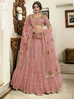 Look Pretty In This Very Beautiful and Heavy Designer Lehenga Choli In All Over Pink Color. This Lehenga Choli And Dupatta Are Fabricated Net Beautified With Detailed Embroidery Which Will Earn You Lots Of Compliments From Onlookers. 