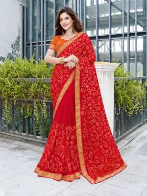 Shine Bright Wearing This Attractive Looking Heavy Designer Saree In Red Color Paired With Orange Colored Blouse. This Saree Is Fabricated on Georgette Beautified With Embroidery Paired With Art Silk Fabricated Blouse. Buy This Designer Saree Now.