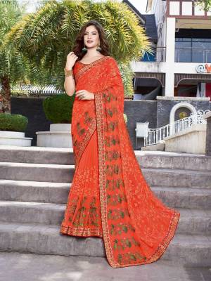 Celebrate This Festive And Wedding Season Wearing This Beautiful Heavy Designer Saree In Orange Color Paired With Orange Colored Blouse. This Saree Is Fabricated On Georgette Paired With Art Silk Fabricated Blouse. Buy Now. 