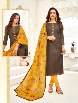 Celebrate This Festive Season Wearing This Designer Straight Suit In Grey Color Paired With Contrasting Musturd Yellow Colored Bottom And Dupatta. Its Top Is Fabricated On Art Silk Paired With Cotton Bottom And Chanderi Fabricated Dupatta. 