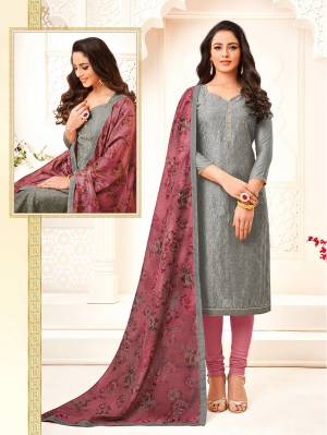 Grab This Lovely Color Pallete With This Designer Suit In Grey Colored Top Paired With Contrasting Onion Pink Colored Bottom And Dupatta. Its Top Is Modal Based Paired With Cotton Bottom And Chanderi Fabricated Dupatta. Its Lovely Color Pallete And Work Definitely Earn You Lots Of Compliments From Onlookers. 