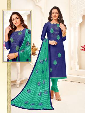 Add This Pretty Straight Suit To Your Wardrobe In Royal Blue Colored Top Paired With Sea Green Colored Bottom And Dupatta. Its Top Is Fabricated On Art Silk Paired With Cotton Bottom And Chiffon Fabricated Dupatta. 