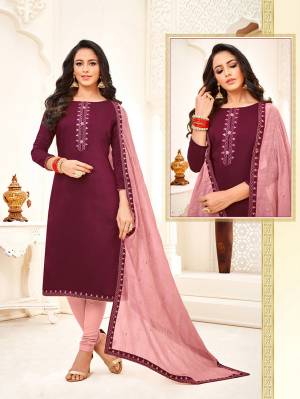 You Will Definitely Earn Lots Of Compliments Wearing This Designer Straight Suit In Wine Colored Top Paired With Baby Pink Colored Bottom And Dupatta. Its Top And Dupatta are Fabricated On Soft Silk Paired With Cotton Fabricated Bottom. 