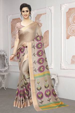 Flaunt Your Rich And Elegant Taste In This Rich Printed Saree In Beige Color Paired With Beige Colored Blouse, This Saree And  Blouse Are Soft Cotton based Beautified With Floral Prints. 