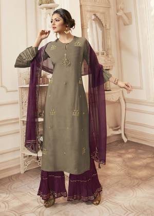 Flaunt Your Rich And Elegant Taste Wearing This Very Beautiful Designer Readymade Straight Suit In Grey Colored Top Paired With Contrasting Wine Colored Bottom And Dupatta. Its Top Is Viscose Rayon Based Paired With Cotton Bottom And Chiffon Dupatta. 
