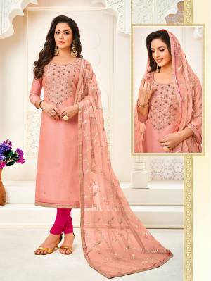 Look Pretty And Earn Lots Of Compliments Wearing This Designer Straight Suit In Peach Colored Top And Dupatta Paired With Dark Pink Colored Bottom. Its Top Is Modal Silk Based Paired With Cotton Bottom And Chiffon Dupatta. 