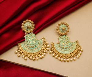 Here Is A Lovely Designer Patterned Earrings Set To Pair Up With Your Heavy Ethnic Wear. This Pretty Pair Is Light In Weight And Easy To Carry Throughout The Gala. 