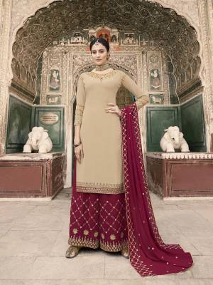Flaunt Your Rich And Elegant Taste With This Evergreen Color Pallete In Beige Colored Top Paired With Maroon Colored Bottom And Dupatta. This Lovely Suit Is Fabricated On Georgette Beautified With Pretty Detailed Embroidery. 