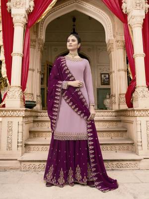 Flaunt Your Rich And Elegant Taste With This Lovely  Color Pallete In Lilac Colored Top Paired With Dark Purple Colored Bottom And Dupatta. This Lovely Suit Is Fabricated On Georgette Beautified With Pretty Detailed Embroidery. 