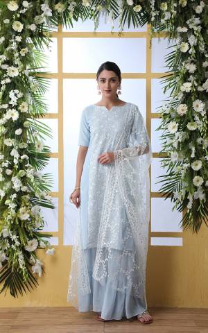 Simple And Elegant Looking Pretty Designer Suit Is Here In Light Baby Blue Color. Its Pretty Embroidered Top Is Fabricated On Georgette Paired With Georgette Bottom And Net Fabricated Embroidered Dupatta. Buy Now.