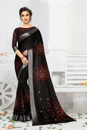 For Your Semi-Casual Wear, Grab This Lovely Printed Saree In Black Color. This Saree And Blouse Are Fabricated On Linen Which Is Light Weight, Soft Towards Skin And Easy To Carry All Day Long. 