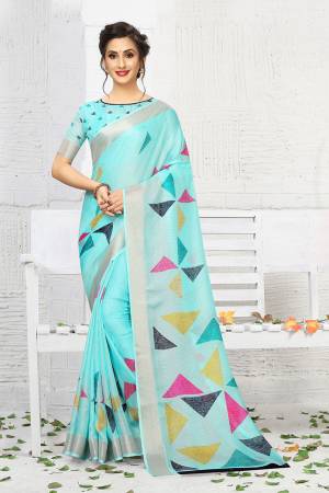 Add This Pretty Elegant Looking Saree To Your Wardrobe In Aqua Blue Color. This Saree And Blouse Are Linen Based Which Gives A Rich Look To Your Personality. Buy Now.