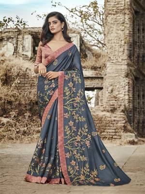 Attract All Wearing This Heavy Designer Saree In Steel Blue Color Paired With Pink Blouse. This Saree Is Fabricated On Satin Silk Paired With Jacquard Silk Fabricated Blouse. Buy This Saree Now.