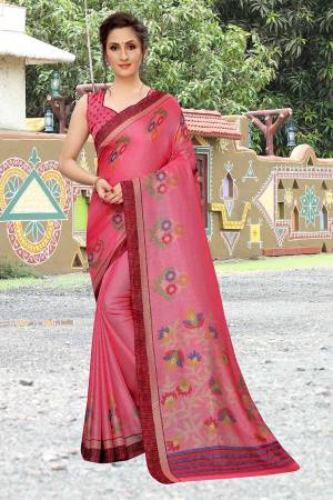 Add This Pretty Elegant Looking Saree To Your Wardrobe In Pink Color. This Saree And Blouse Are Linen Based Which Gives A Rich Look To Your Personality. Buy Now.