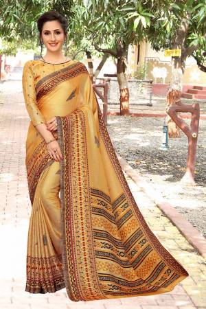 For Your Semi-Casual Wear, Grab This Lovely Printed Saree In Yellow Color. This Saree And Blouse Are Fabricated On Linen Which Is Light Weight, Soft Towards Skin And Easy To Carry All Day Long. 