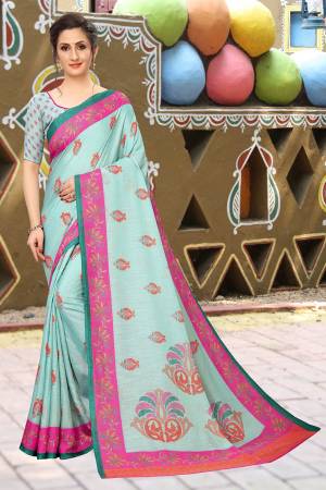 For Your Semi-Casual Wear, Grab This Lovely Printed Saree In Aqua Blue Color. This Saree And Blouse Are Fabricated On Soft Cotton Which Is Light Weight, Soft Towards Skin And Easy To Carry All Day Long. 