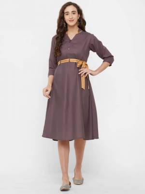 For A Trendy Look, Grab This Designer Readymade Kurti In Mauve Color. This Pretty Plain Kurti Is Fabricated On Rayon Which Comes With A Trendy Belt. This Pretty Kurti Will Definitely Earn You Lots Of Compliments From Onlookers.
