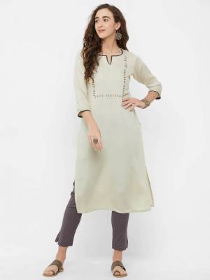 Simple And elegant Looking Readymade Kurti Is Here For Your Casual Wear In Off-White Color. This Kurti Is Fabricated On Rayon And Can Be Paired With Same Or Contrasting Colored Bottom. 
