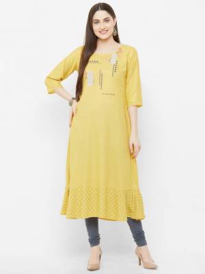 You Will Definitely Earn Lots Of Compliments Wearing This Readymade Kurti In Yellow Color Fabricated On Rayon. It Is Light In Weight And Easy To Carry all Day Long. 