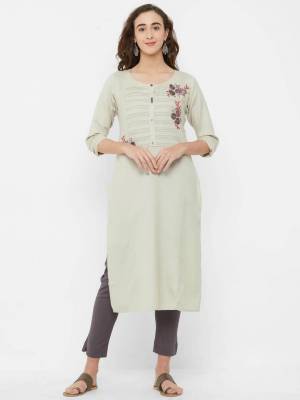 Simple And elegant Looking Readymade Kurti Is Here For Your Casual Wear In Off-White Color. This Kurti Is Fabricated On Rayon And Can Be Paired With Same Or Contrasting Colored Bottom. 