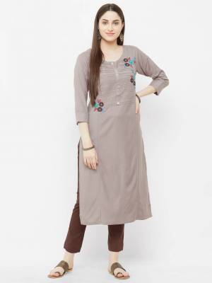 Simple And elegant Looking Readymade Kurti Is Here For Your Casual Wear In Mauve Color. This Kurti Is Fabricated On Rayon And Can Be Paired With Same Or Contrasting Colored Bottom. 