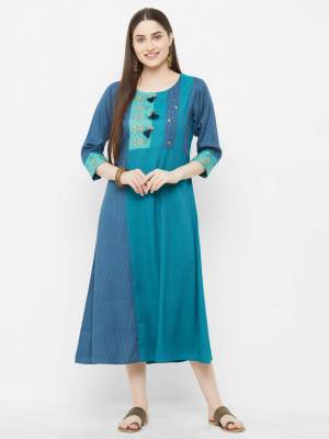 Grab This Readymade Kurti In Blue Color Fabricated On Rayon. This Pretty Simple Kurti Is Suitable For Your Casual Or Semi-Casuals. Also It Is Available In All Regular Sizes.