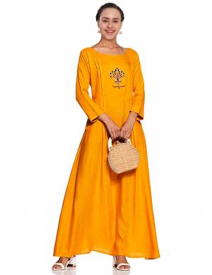 Grab This Readymade Long Kurti In Musturd Yellow Color Fabricated On Cotton. This Pretty Kurti Is Suitable For Your Semi-Casual Wear Beautified With Thread Work. 