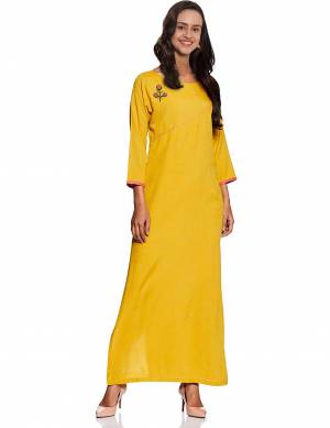 Grab This Readymade Long Kurti In Yellow Color Fabricated On Cotton. This Pretty Kurti Is Suitable For Your Semi-Casual Wear Beautified With Thread Work. 