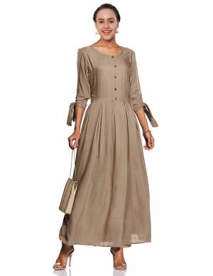 New Shade Is Here To Add Into Your Wardrobe With This Readymade Designer Long Kurti In Sand Grey Color. This Kurti IS Fabricated On Rayon With A Lovely Sleeve Pattern. 