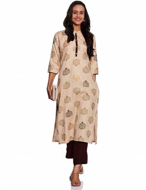 Here Is A Pretty Pair Of Readymade Kurti With Bottom In Beige And Brown Color Respetively. This Printed Kurti Is Fabricated On Cotton Paired With Rayon Fabricated Plain Bottom. 