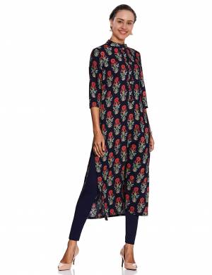 For Your Casual Wear, Grab This Pretty Floral Printed Readymade Kurti In Navy Blue Color Fabricated On Rayon. It Is Light Weight, Soft Towards Skin And Easy To Carry All Day Long. 