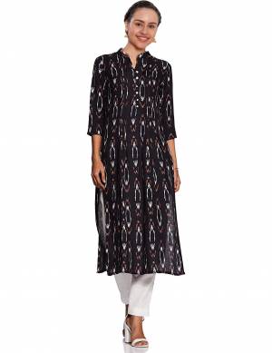 For Your Casual Wear, Grab This Pretty Floral Printed Readymade Kurti In Black Color Fabricated On Rayon. It Is Light Weight, Soft Towards Skin And Easy To Carry All Day Long. 