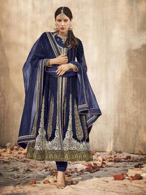 Grab This Beautiful Heavy Designer Anarkali Suit In Royal Blue Color. Its Heavy Embroidered Top IS Fabricated On Velvet Paired With Santoon Bottom And Net Fabricated Dupatta. Buy This Semi-Stitched Suit Now.