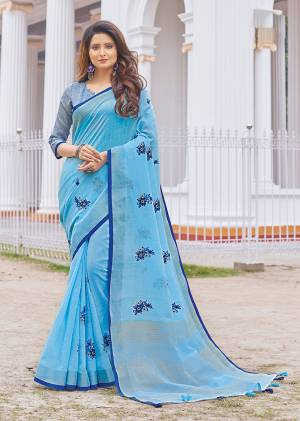 Flaunt Your Rich And Elegant Taste Wearing This Lovely Blue Color Paired With Blue Colored Blouse. This Saree And Blouse Are Fabricated On Linen Cotton Which Gives A Rich Look To Your Personality. It Is Beautified With Embroidered Butti All Over The Saree