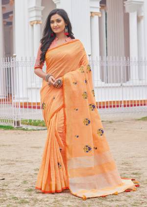 You Will Definitely Earn Lots Of Compliments Wearing This Designer?Saree In Orange Color Paired With Orange Colored Blouse. This Saree And Blouse Are Fabricated On Rich Linen Cotton Fabric. This Pretty Saree Is Light Weight, Durable And Easy To Carry All Day Long