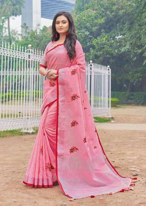 Flaunt Your Rich And Elegant Taste Wearing This Lovely Pink Color Paired With Pink Colored Blouse. This Saree And Blouse Are Fabricated On Linen Cotton Which Gives A Rich Look To Your Personality. It Is Beautified With Embroidered Butti All Over The Saree
