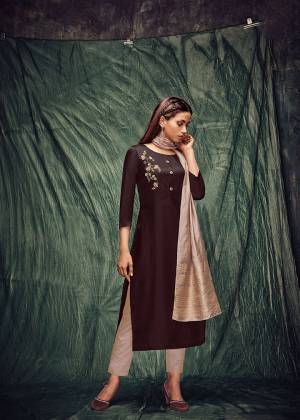 Enhance Your Personality Wearing This Readymade Kurti In Dark Brown Color Paired With Dusty Peach Colored Dupatta. Its Top Is Fabricated On Tussar Silk Paired With Viscose Silk Fabricated Dupatta. It Is Beautified With Hand Work. You Can Pair This Kurti With Pants, Plazzo Or Leggings. 