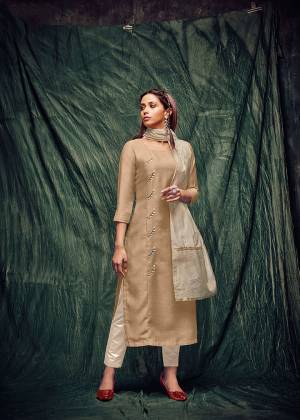 Go With The Pretty Elegant Shades Wearing This Readymade Kurti In Beige Color Paired With Cream Colored Dupatta. Its Top Is Art Silk Based Paired With Viscose Silk Dupatta. Buy This Pretty Pair Of Kurti and Dupatta Now.